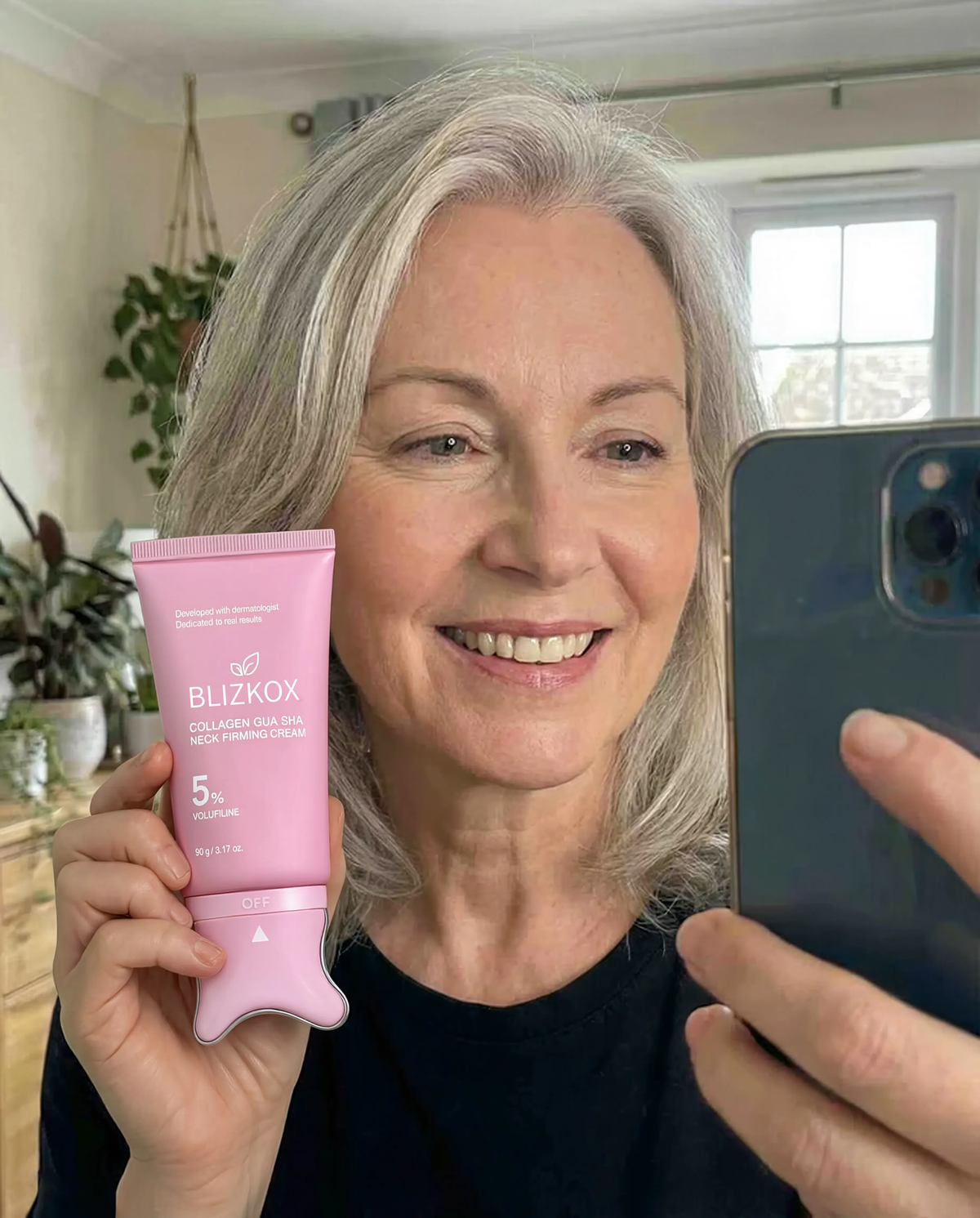 Margaret holding Aeterna skincare cream