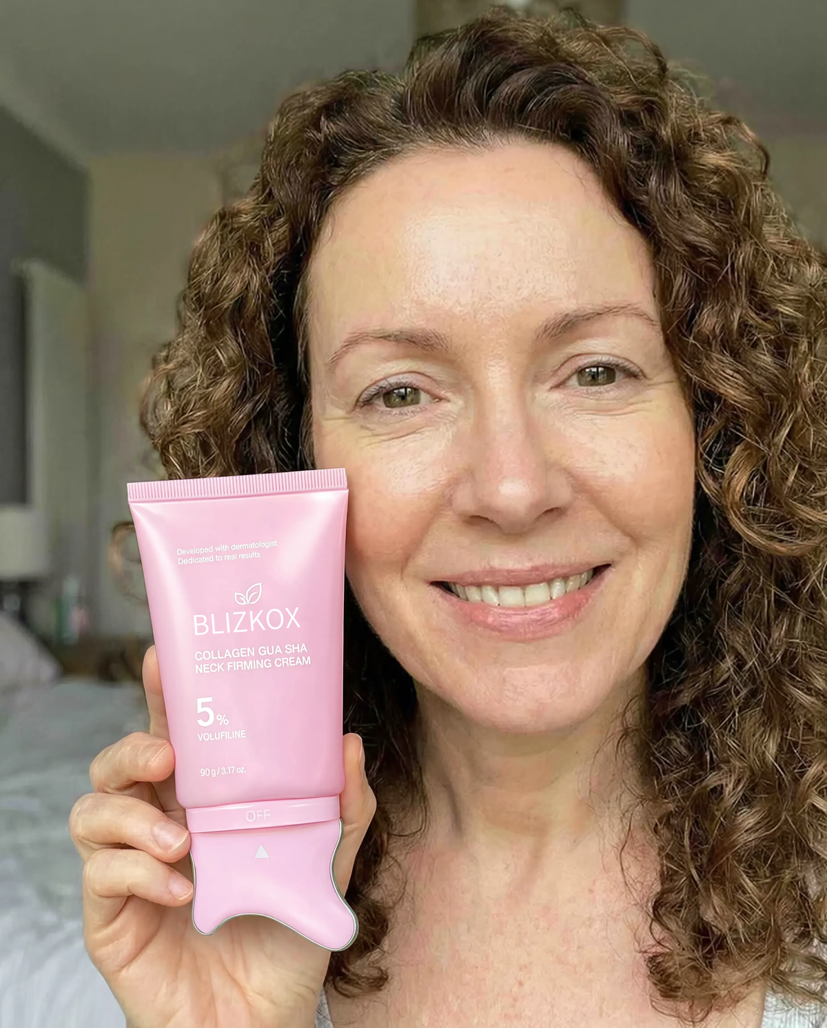Patricia holding Aeterna skincare cream